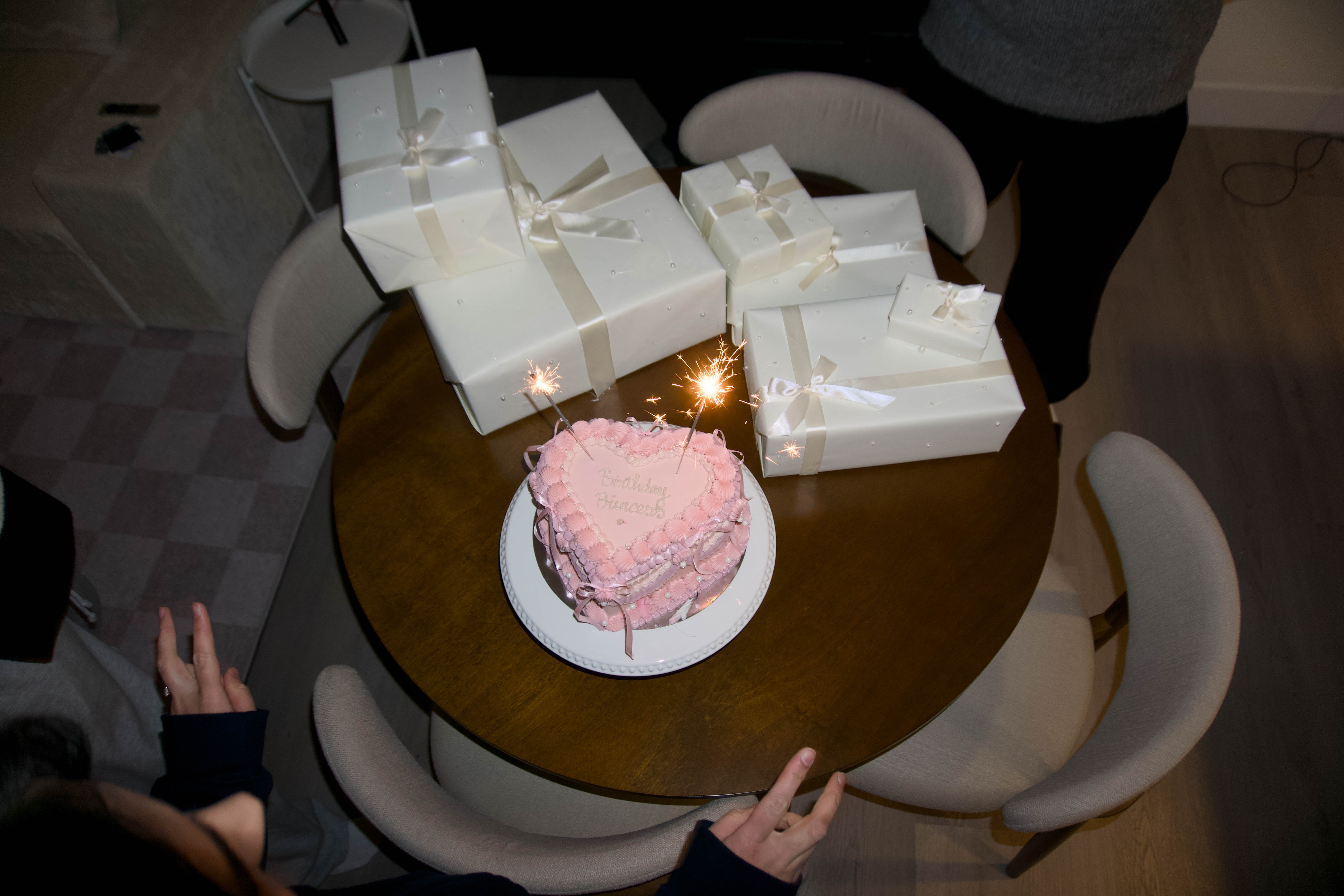 Birthday celebration with cake and gifts