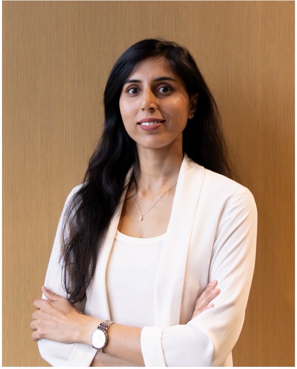 Corporate headshot of a woman in a cream blazer — Hasham Lens, London Ontario photographer